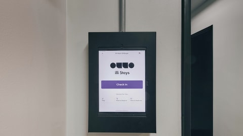 Check-in/check-out kiosk