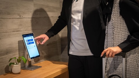 Check-in/check-out kiosk