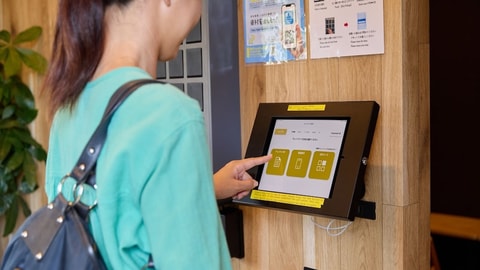 Check-in/check-out kiosk