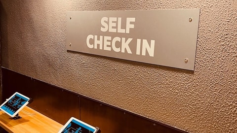 Check-in/check-out kiosk
