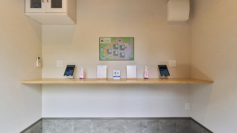 Check-in/check-out kiosk