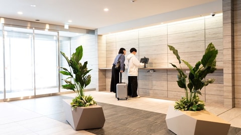 Check-in/check-out kiosk