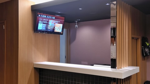 Check-in/check-out kiosk