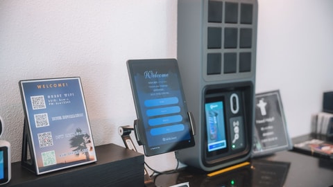 Check-in/check-out kiosk