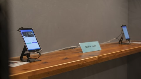 Check-in/check-out kiosk